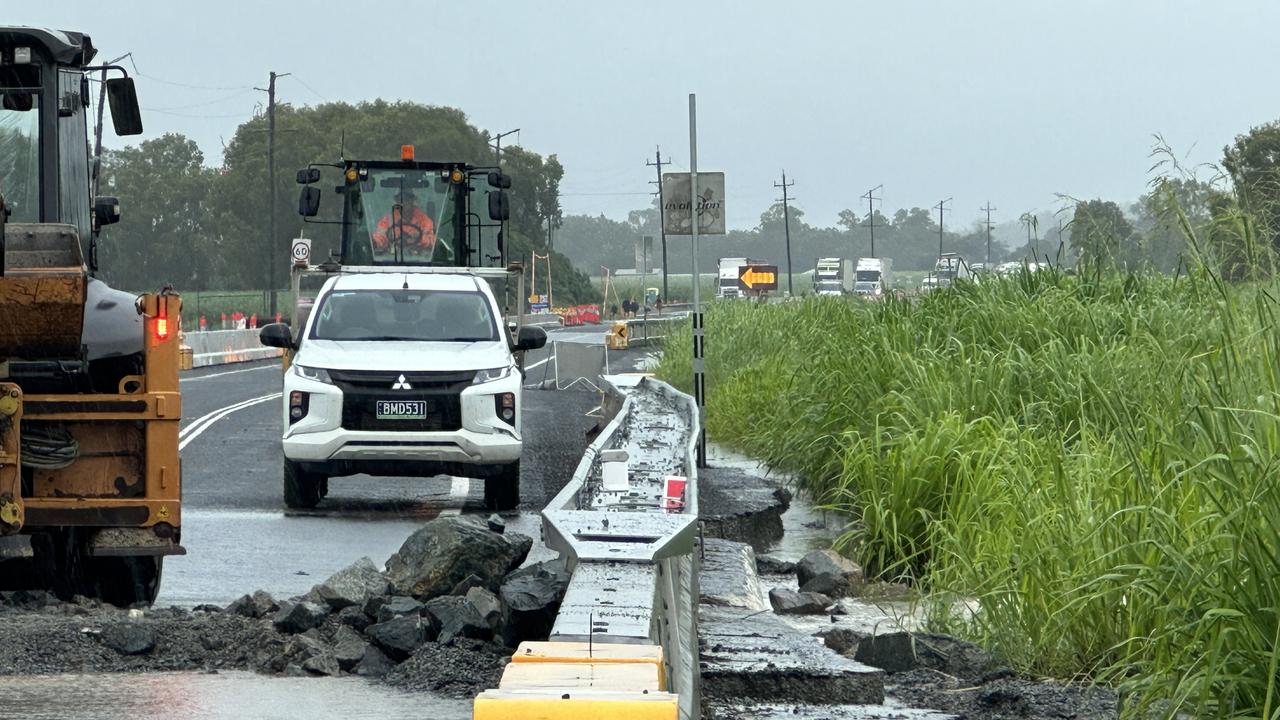 Crews work to make emergency repairs along the Bruce Highway at Calen after heavy rain reduced it to rubble. January 14, 2023. Picture: Heidi Petith