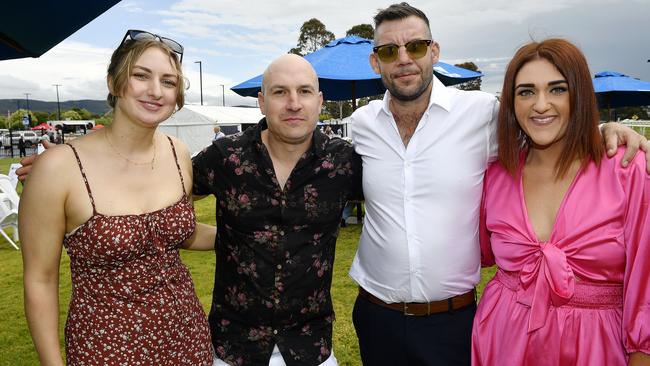 The Ladbrokes 2024 Moe Cup is held at Moe Horse Racing Club, Moe Victoria, Friday 18th October 2024. Racegoers Cedar, Jeremy, Stephen and Malaya enjoying the races.Picture: Andrew Batsch