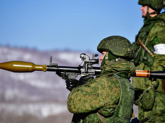 PRIMORYE TERRITORY, RUSSIA - FEBRUARY 2, 2017: A marine aims an RPG-7, a portable rocket-propelled grenade launcher, during military exercises conducted by the Russian Pacific Fleet's naval infantry unit at the Bamburovo firing range. The drills are a part of preparations for the Suvorov Attack and Sniper Line army competitions. Yuri Smityuk/TASS (Photo by Yuri Smityuk\\TASS via Getty Images)