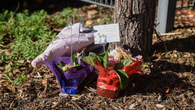 Flowers left outside Newmarch House in 2020 after residents began dying from Covid, while their families watched on helplessly from outside the facility. Picture: Flavio Brancaleone