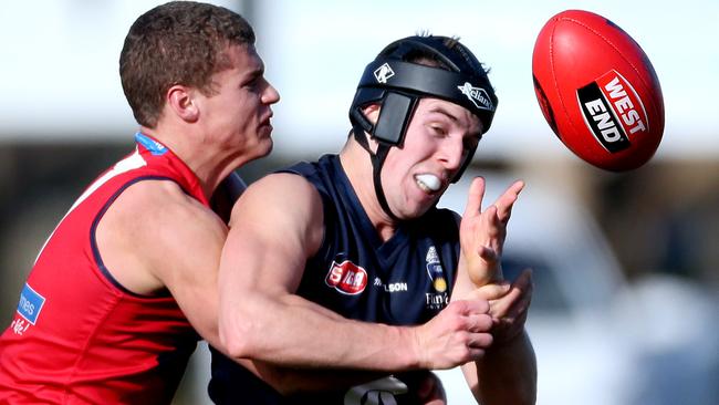 26/07/15 Norwood v South Adelaide at South Adelaide. Nathan Daniel tackled by Kane Murphy. photo Calum Robertson