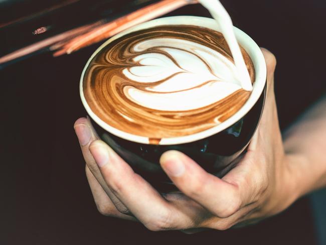 A barista making a coffee in cafe,Photo -  istockEscape 10 July 2022doc holiday