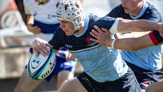 Angus Staniforth scores for the Gen Blue side.