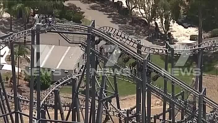 Movie World visitors were left trapped at the top of the Arkham Asylum ride when the ride suddenly stopped. 