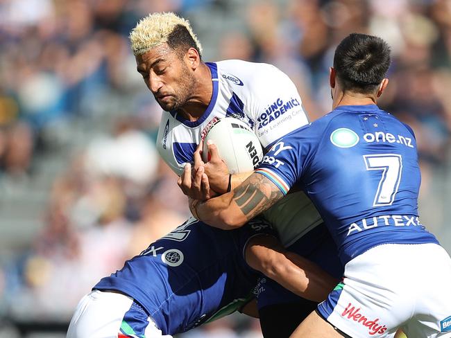 AUCKLAND, NEW ZEALAND - MARCH 26: Viliame Kikau of the Bulldogs is tackled during the round four NRL match between New Zealand Warriors and Canterbury Bulldogs at Mt Smart Stadium on March 26, 2023 in Auckland, New Zealand. (Photo by Phil Walter/Getty Images)