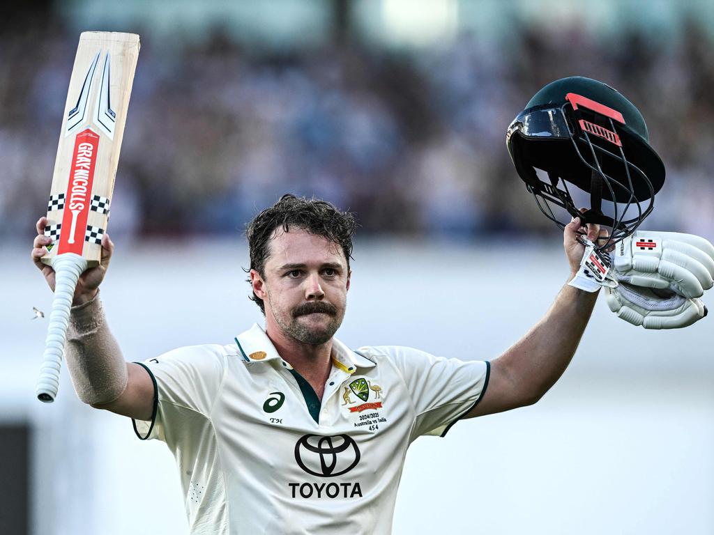 Travis Head celebrates one of his four centuries this Allan Border Medal period. (Photo by Michael ERREY / AFP)