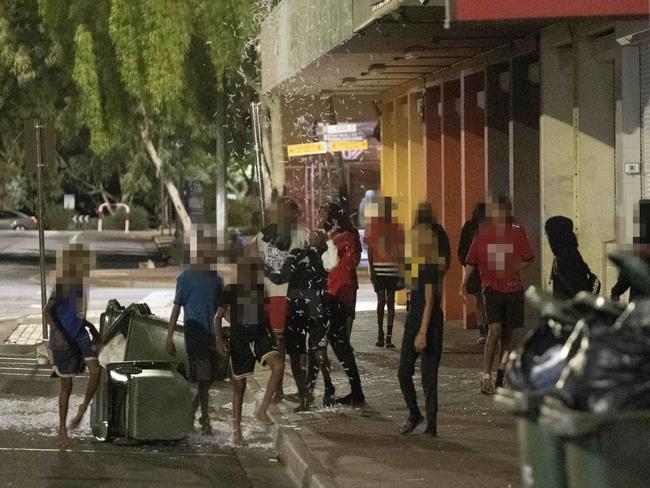 BLURRED VERSION - 13-04-2023 - Young children roaming the streets of Alice Springs just before midnight on Thursday. Picture: Liam Mendes / The Australian