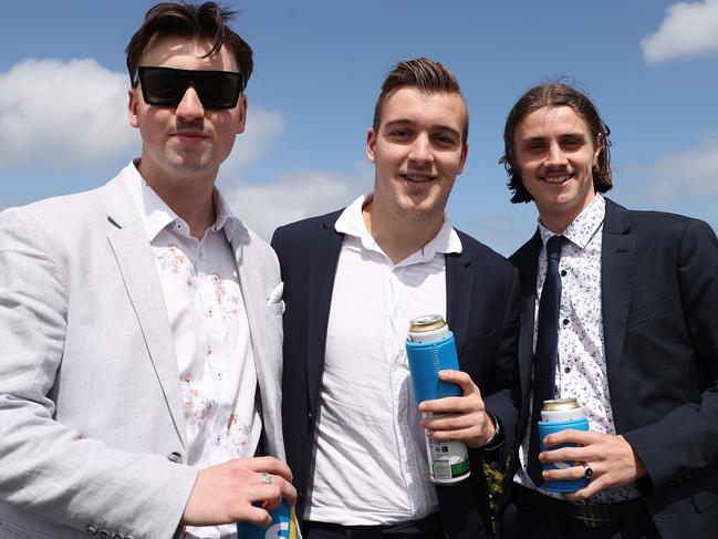 Racegoers pose for a snap. Picture: Getty Images