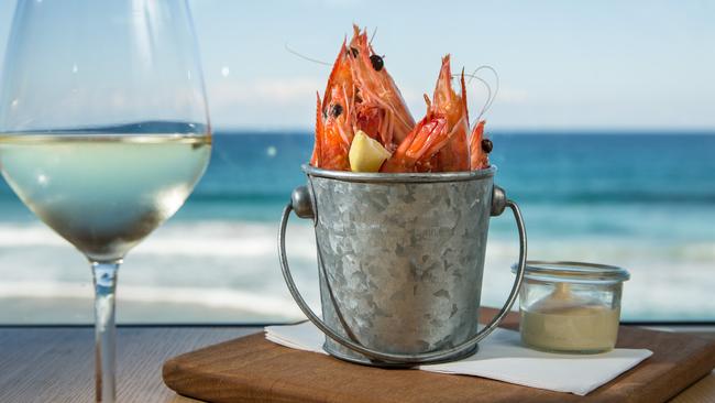 Try Avalon on the Beach’s fresh tiger prawns with a glass of white, BYO is Tuesday night. Picture: Braden Fastier.