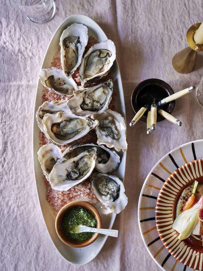 Oysters with green chilli and yuzu vinaigrette. Picture: Con Poulos