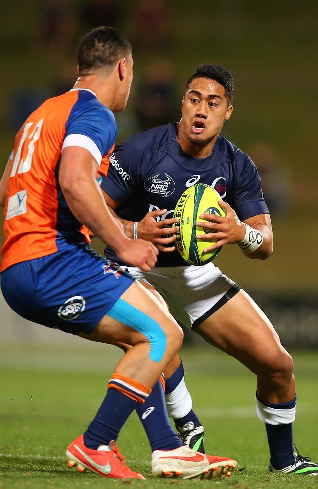 Queensland Country fullback JJ Taulagi runs the ball.