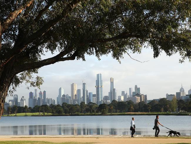 MELBOURNE, AUSTRALIA - SEPTEMBER 09: People exercise at Albert Park Lake on September 09, 2020 in Melbourne, Australia. Metropolitan Melbourne remains under stage 4 lockdown restrictions, with people only allowed to leave home to give or receive care, shopping for food and essential items, daily exercise and work while an overnight curfew from 8pm to 5am is also in place. The majority of retail businesses are also closed. Other Victorian regions are in stage 3 lockdown. The restrictions, which came into effect from 2 August, were introduced by the Victorian government as health authorities work to reduce community COVID-19 transmissions across the state. (Photo by Robert Cianflone/Getty Images)