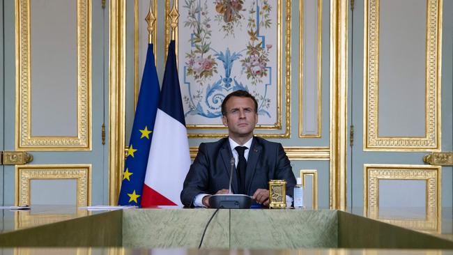 French President Emmanuel Macron attends the virtual Climate Summit, video conference call from the Elysee Palace in Paris.