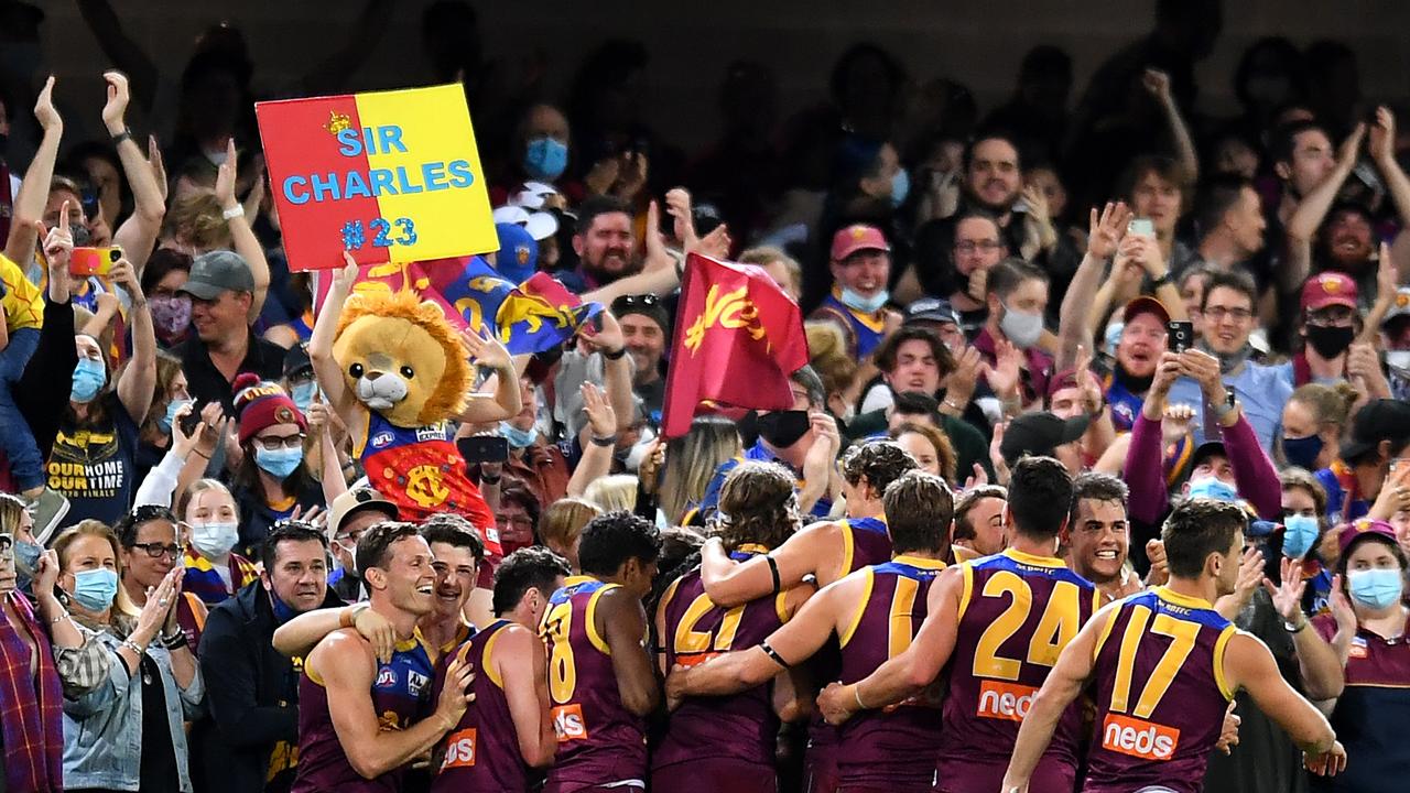 Brisbane Lions celebrate victory during the round 23 AFL match. Picture: Albert Perez/Getty