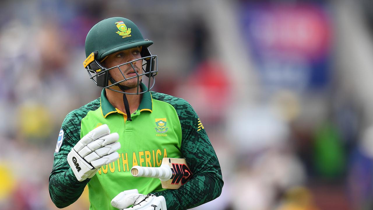 MANCHESTER, ENGLAND - JULY 06: Quinton de Kock of South Africa walks off after being dismissed oof the bowling of Nathan Lyon of Australia during the Group Stage match of the ICC Cricket World Cup 2019 between Australia and South Africa at Old Trafford on July 06, 2019 in Manchester, England. (Photo by Clive Mason/Getty Images)