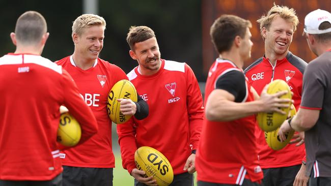 Isaac Heeney, Jake Lloyd and Callum Mills share a laugh at Sydney training last week. Picture: Phil Hillyard