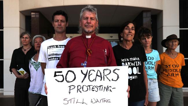 No New Gas Coalition members Grusha Leeman, Juanita Kwok, Phil Scott, Reverend L Lee Levett-Olson, Chris Cox, Alice Nagy and Liz Howells outside the Supreme Court in Darwin. Picture: Zizi Averill