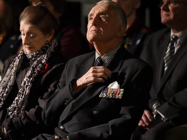 An ex-serviceman watches on during the Anzac Day dawn service in Sydney. Picture: AAP Image/Dan Himbrechts