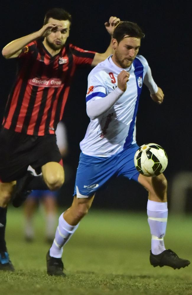 Luke Alderson controls the ball for Woombye. Photo: Che Chapman