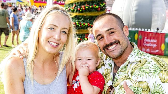 The Burns family from Burpengary East pose for a photograph at Caboolture Christmas Carols. (AAP Image/Richard Walker)