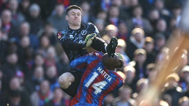 Millwall goalkeeper Liam Roberts karate kicks Jean-Philippe Mateta. Photo by Jacques Feeney/Offside/Offside via Getty Images.