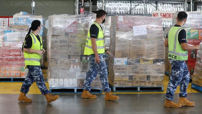 Aircraft crew prepare to load supplies onto a supply plane in Adelaide. Picture: Sarah Reed/Getty Images