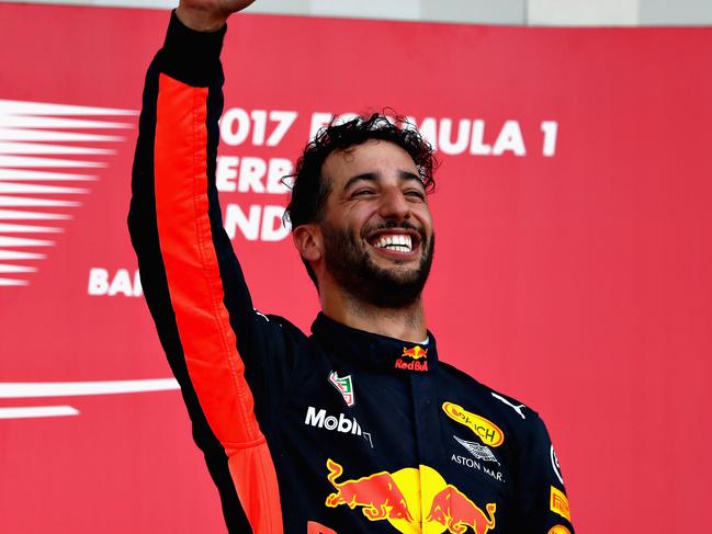 BAKU, AZERBAIJAN - JUNE 25:  Race winner Daniel Ricciardo of Australia and Red Bull Racing celebrates his win on the podium during the Azerbaijan Formula One Grand Prix at Baku City Circuit on June 25, 2017 in Baku, Azerbaijan.  (Photo by Clive Rose/Getty Images)