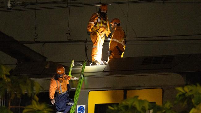 Train Delays Train hitting a powerlines near Homebush station. Picture: Thomas Lisson