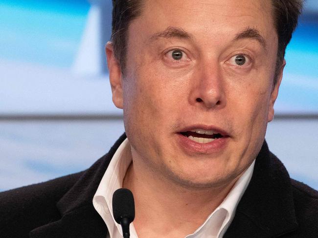 (FILES) In this file photo SpaceX chief Elon Musk speaks during a press conference after the launch of SpaceX Crew Dragon Demo mission at the Kennedy Space Center in Florida on March 2, 2019. - Elon Musk, the charismatic chief of electric automaker Tesla, has overtaken Bill Gates to become the world's second richest person, according to the Bloomberg list of billionaires. The South African-born Musk, 49, added $7.2 billion in wealth on November 23, 2020 alone following Tesla's latest surge. He now has an estimated $128 billion. (Photo by Jim WATSON / AFP)