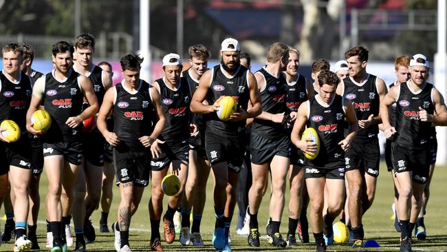 Port Adelaide players including Paddy Ryder, middle, at Alberton on Thursday. Picture: AAP Image/Sam Wundke