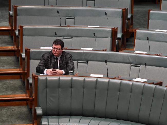 Alone with his thoughts ... Christensen in parliament today. Picture: AAP