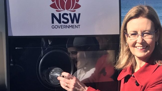 NSW Environment Minister Gabrielle Upton with a container deposit scheme reverse vending machine.