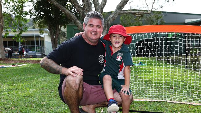 Tayler Kelly with his son Levi Kelly, 5, at the Whitfield State School Father's Day activity afternoon. Picture: Brendan Radke