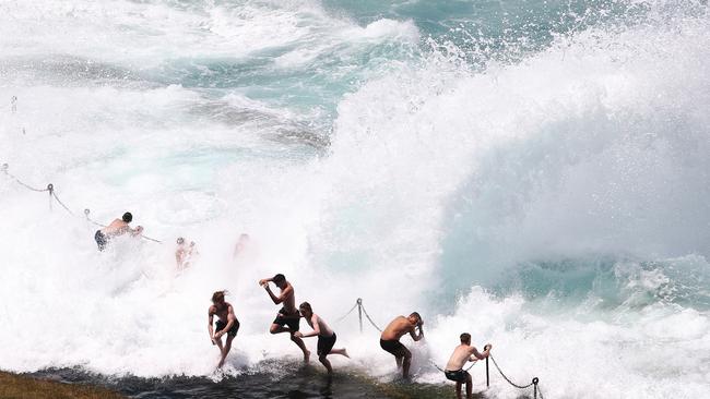 Doing The Bogey Hole Boogie … do not underestimate the waves at Bogey Hole Newcastle. Picture: Peter Lorimer