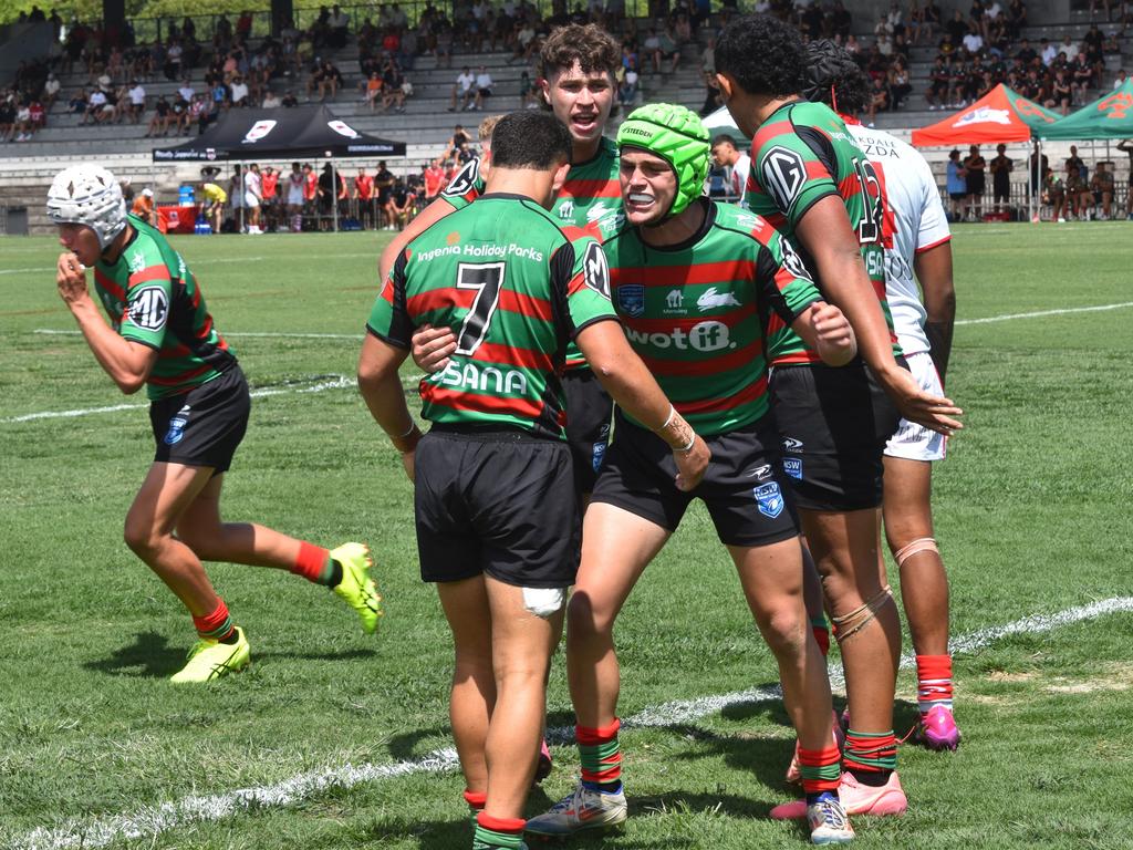 Hudson Warren (headgear) and James Davies celebrate a big tackle. Picture: Sean Teuma