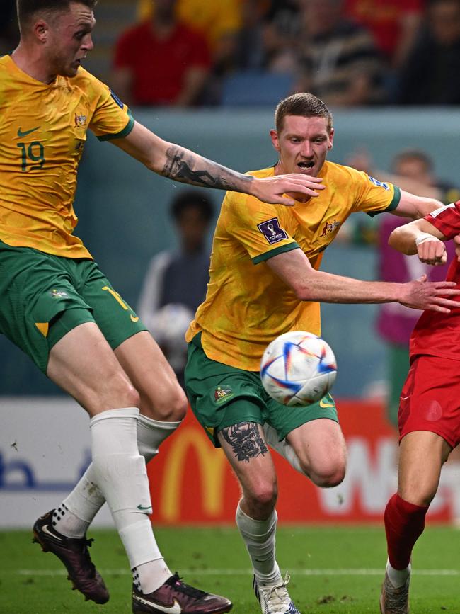 Australia defenders Harry Souttar (L) and Kye Rowles have been superb at the back in the Socceroos’ past two World Cup wins. They will be key to stopping Argentina’s relentless attack. Picture: Paul ELLIS / AFP