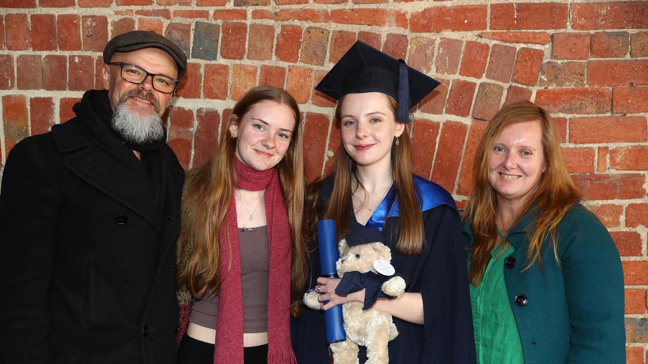 Deakin University graduate Ella Van Kollenburg, with dad Daniel, sister Mia and mum Meg. Picture: Alison Wynd