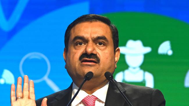 (FILES) In this file photo taken on November 19, 2022, Chairperson of Indian conglomerate Adani Group, Gautam Adani, speaks at the World Congress of Accountants in Mumbai. - Indian industrialist Gautam Adani is Asia's richest man, with a business empire spanning coal, airports, cement and media now rocked by corporate fraud allegations (Photo by INDRANIL MUKHERJEE / AFP)