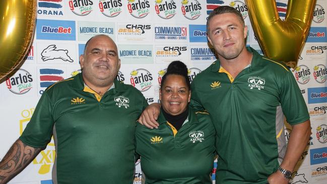 Loretta Donovan (women’s team coach), Sam Hopi (men’s reserves team coach) and Burgess at the season launch.