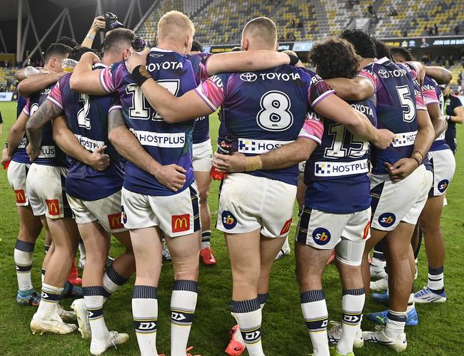 The Cowboys gather in a huddle after beating the Tigers. Picture: Ian Hitchcock/Getty