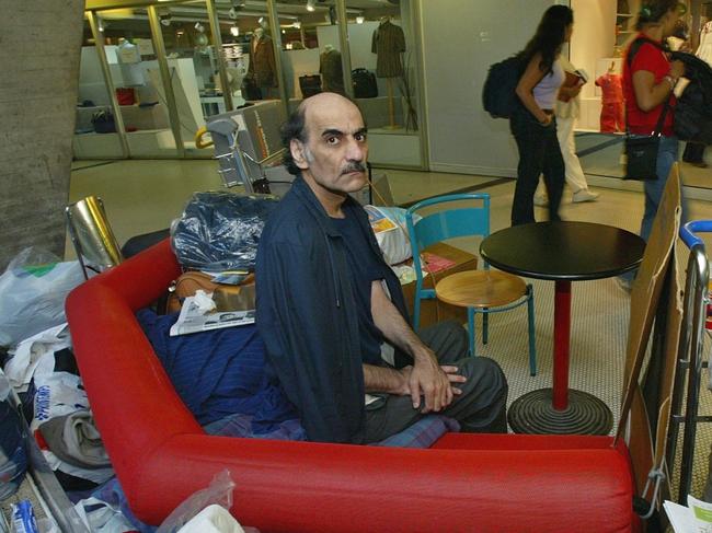 AUGUST 11, 2004 :  Mehran Karimi Nasseri aka Alfred Mehran sits among his belongings at Terminal 1 of Roissy Charles De Gaulle Airport, north of Paris 11/08/04, inspiration for 2004 film "The Terminal".France / People / Homeless