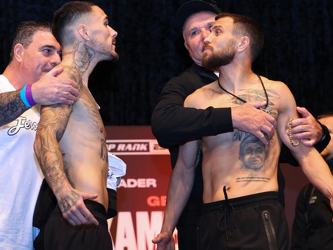 Kambosos and Lomachenko had to be separated at Saturday's weigh-ins. Picture: Mikey Williams/Top Rank