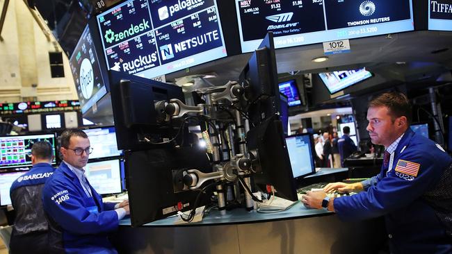 NEW YORK, NY - SEPTEMBER 04: Traders work on the floor of the New York Stock Exchange (NYSE) on September 4, 2015 in New York City. The Dow Jones industrial average finished the day down over 250 points, furthering losses for the week. Spencer Platt/Getty Images/AFP == FOR NEWSPAPERS, INTERNET, TELCOS & TELEVISION USE ONLY ==