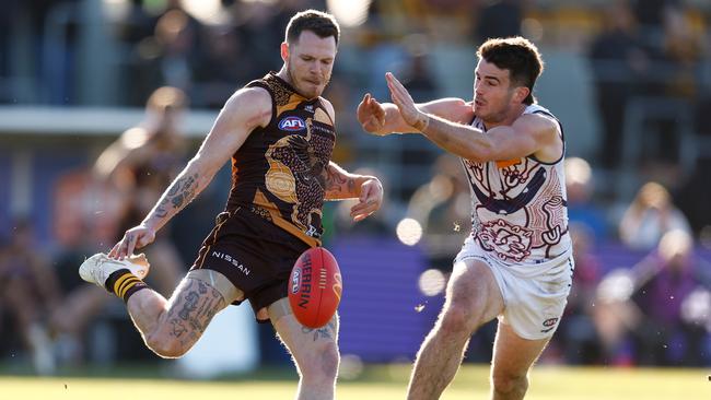 LAUNCESTON, AUSTRALIA - JULY 13: Blake Hardwick of the Hawks is tackled by Andrew Brayshaw of the Dockers during the 2024 AFL Round 18 match between the Hawthorn Hawks and the Fremantle Dockers at the UTAS Stadium on July 13, 2024 in Launceston, Australia. (Photo by Michael Willson/AFL Photos via Getty Images)