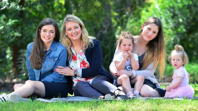 The Babes Project founder Helen Parker with her daughter Ariel, 18, young mum Lauren and her two children, Skye, 3 and Willow, 1, who have been supported by the organisation. Picture: Nicki Connolly