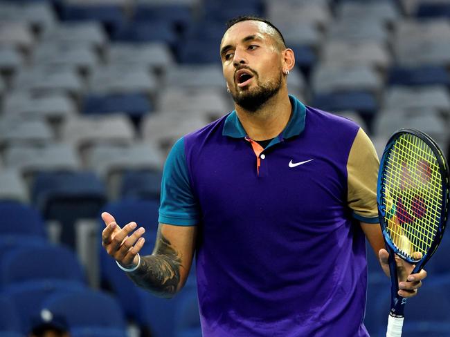 Australia's Nick Kyrgios reacts on a point against Portugal's Frederico Ferreira Silva during their men's singles match on day one of the Australian Open tennis tournament in Melbourne on February 8, 2021. (Photo by Paul CROCK / AFP) / -- IMAGE RESTRICTED TO EDITORIAL USE - STRICTLY NO COMMERCIAL USE --