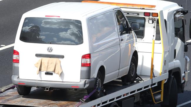 Paul Virgona’s van is towed away after the shooting. Picture: David Crosling