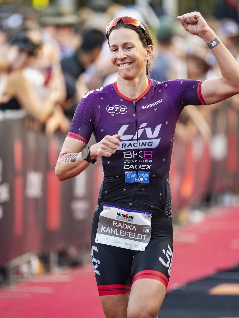 Cairns Iron Man - Womens Pro Winner second place getter Radka Kahlefeldt crosses the finish . Picture: Brian Cassey