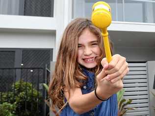 YOUNGEST AGENT: Eight year old Gabby Dobbin-Lavery helped seal the deal in her first ever property sale.