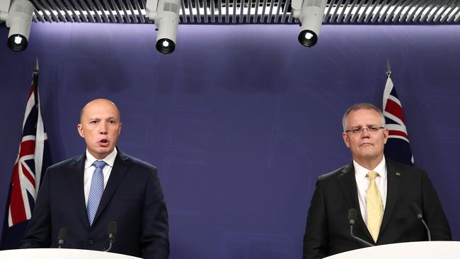 Prime Minister Scott Morrison and Minister for Home Affairs Peter Dutton speaks during a press conference. Picture: Getty